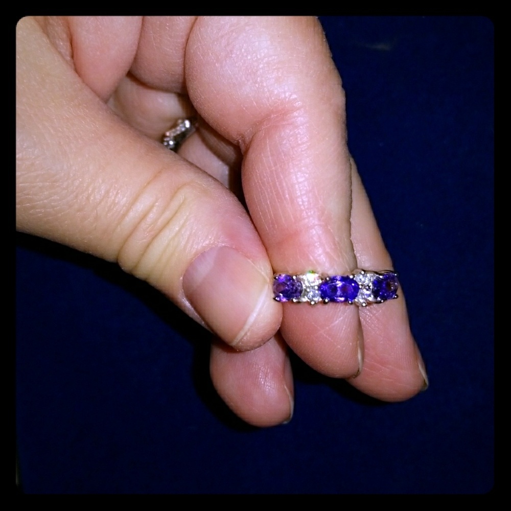 Beautiful tanzinite ring with cz accents